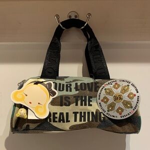 Harajuku Lovers Camo Print Clutch with Black Handles and Gold Accent Charms